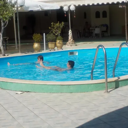 מלון Achillion Palace
